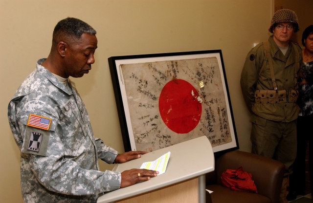Captured Japanese Yosegaki flag returns to Camp Jackson, 81st Infantry Division during 101st Army Reserve Birthday Celebration
