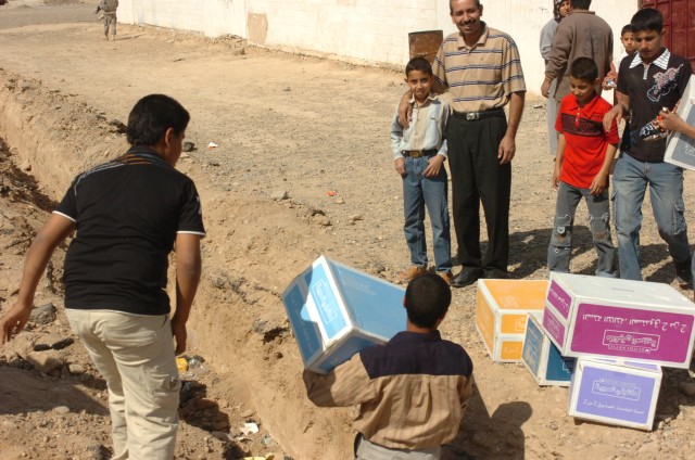 Tropic Lightning Security Detachment Donates Books to Local Tikrit Schools