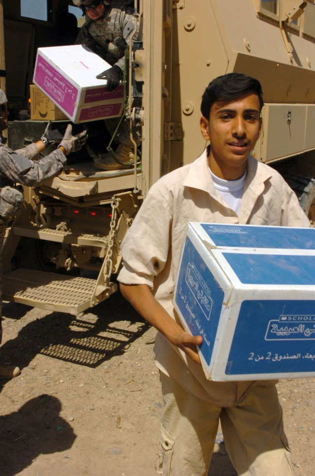 Tropic Lightning Security Detachment Donates Books to Local Tikrit Schools