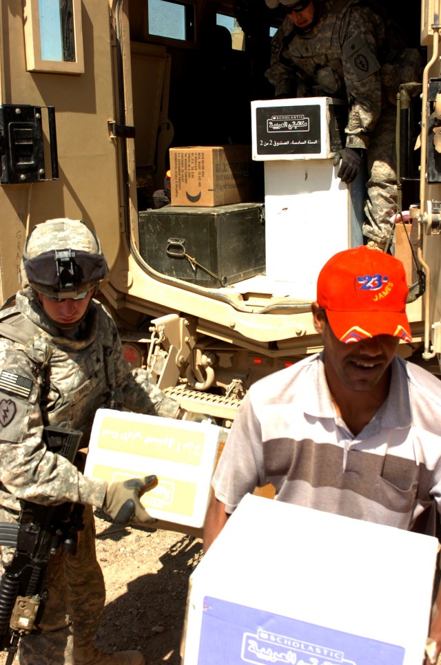 Tropic Lightning Security Detachment Donates Books to Local Tikrit Schools