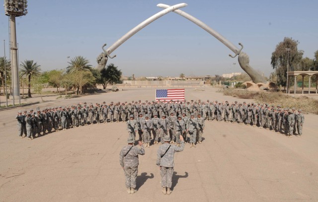 BAGHDAD - Eighty-two paratroopers assigned to the 5th Squadron, 73rd Cavalry Regiment, 3rd Brigade Combat Team, 82nd Airborne Division, Multi-National Division -Baghdad recite the oath of reenlistment April 23 during a ceremony at the Cross Sabers in...