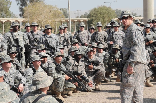 BAGHDAD - Lt. Col. Dave Buckingham, commander, 5th Squadron, 73rd Cavalry Regiment, 3rd Brigade Combat Team, 82nd Airborne Division, Multi-National Division - Baghdad, speaks to his paratroopers following a reenlistment ceremony April 23 at the Cross...