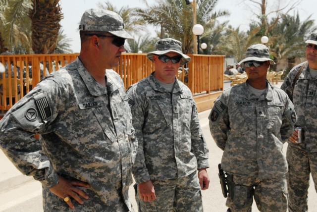 BAGHDAD - Louisiana National Guard's senior enlisted advisor, Command Sgt. Maj. Tommy Caillier (left), visits with the personal security detachment Soldiers from 225th Engineer Brigade from Pineville, La., at Camp Liberty April 22. Caillier told...