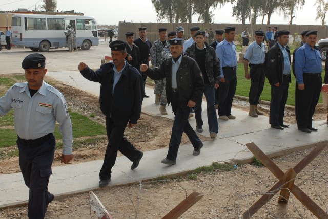 Kirkuk city police attend an award ceremony for 21 officers that are receiving U.S. Army Achievement Medals April 8 in Kirkuk city from 3rd Battalion, 82nd Field Artillery Regiment, 2nd Brigade Combat Team, 1st Cavalry Division, who they partner...