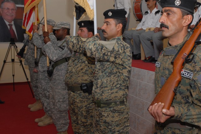Both Iraqi police officers and 3rd Battalion, 82nd Field Artillery, 2nd Brigade Combat Team, 1st Cavalry Division, also known as the "Red Dragons," Soldiers honored 21 IPs who were given U.S. Army Achievement Medals April 8 in Kirkuk city during...