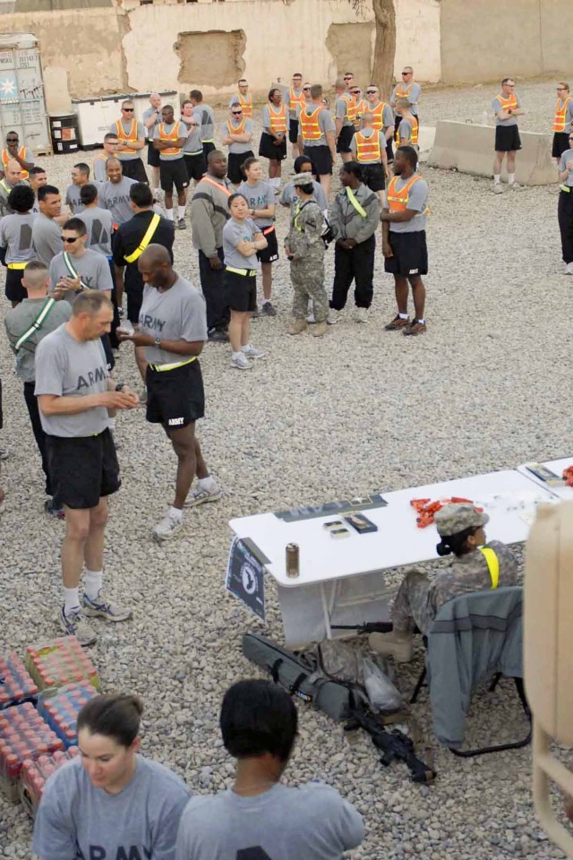 A crowd is gathered at the Forward Operating Base Marez gym April 24 for a 4-mile run in support of Sexual Assault Awareness Month. The event was organized by the 3rd Heavy Brigade Combat Team Equal Opportunity Team to raise awareness of sexual...