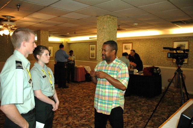 Youth shadow potential employers at Fort Gillem job fair