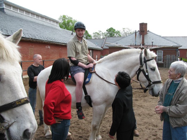 Dr. Lynn Heirakuji meets with wounded warriors at The Old Guard