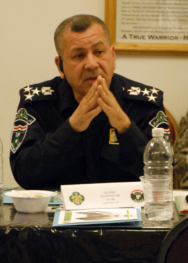 BAGHDAD - Iraqi Police Brig. Gen. Amad Ismail Al-Shafi, Taji district commander, discusses detainee reintegration with fellow district commanders and Coalition forces of 93rd Military Police Battalion, 8th MP Brigade and 2nd Brigade Combat Team,...