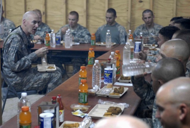 Maj. Gen. Daniel Bolger, Commander of Multi-National Division-Baghdad and the First Cavalry Division, speaks with leaders assigned to the 1st Squadron, 9th Cavalry Regiment, 4th Brigade Combat Team, 1st Cavalry Division, during his visit to Joint...