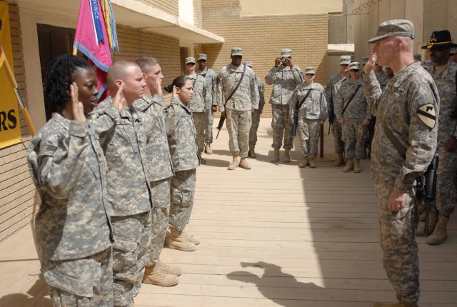 Maj. Gen. Daniel Bolger, Commander of Multi-National Division-Baghdad and the First Cavalry Division, re-enlists Soldiers from the 27th Brigade Support Battalion, 4th Brigade Combat Team, 1st Cavalry Division, during his visit to Contingency...