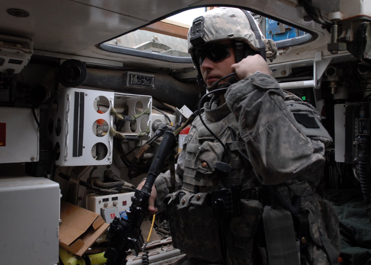 Commo check Soldier performs mike test before patrol Article The United States Army