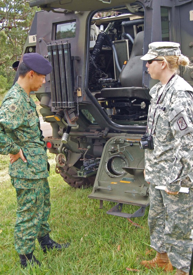 Singapore Soldiers visit, exchange information with 45th Soldiers