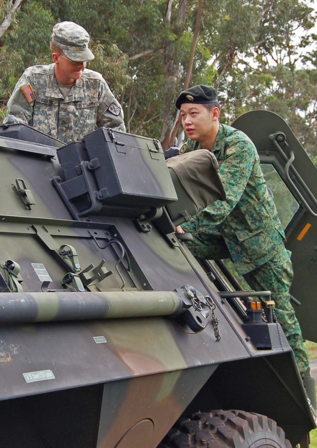 Singapore Soldiers visit, exchange information with 45th Soldiers