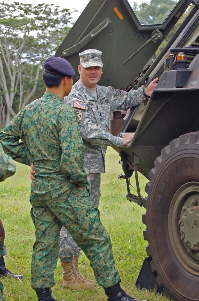 Singapore Soldiers visit, exchange information with 45th Soldiers