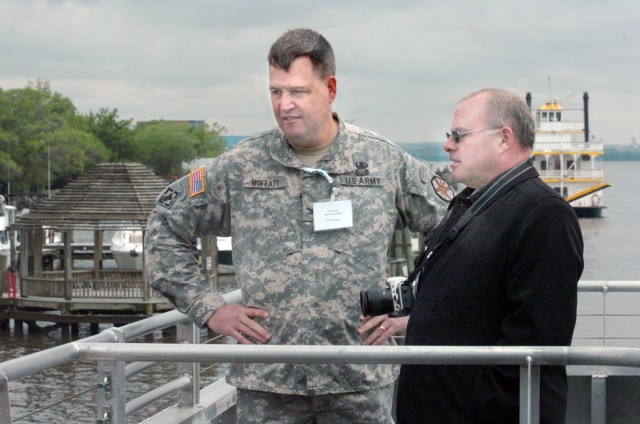 Belvoir officials take ride on a river boat 