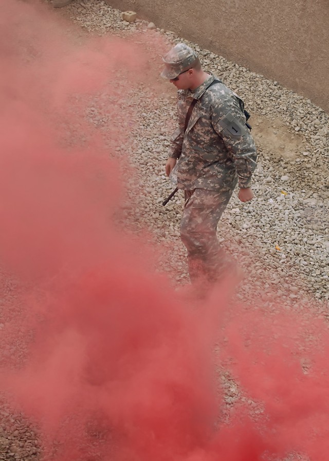 BAGHDAD -Sgt. James Scaggs, who hails from Beaver, Ohio, 5th Squadron "Longknife,"  4th Cavalry Regiment, 2nd Heavy Brigade Combat Team, 1st Infantry Division, Multi-National Division - Baghdad, observes Iraqi Soldiers serving with the 6th Iraqi...