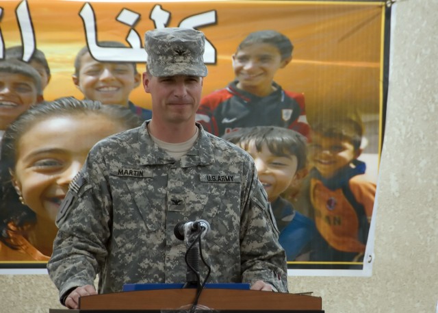 BAGHDAD -  Dearborn, Mich. native, Col. Joseph Martin, commander, 2nd Heavy Brigade Combat Team, 1st Infantry Division, Multi-National Division-Baghdad, speaks of the improvements in security as an important factor in the completion ceremony of...