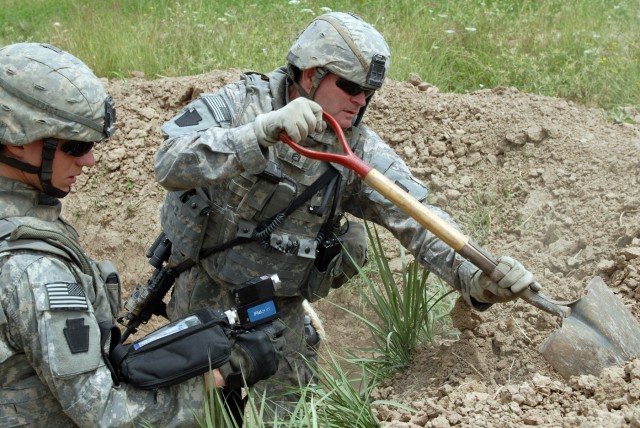 BAGHDAD - Sgt. Sean Vinsick (left), who hails from North Versailles, Pa., and Staff Sgt. Paul Jones, a native of Waynesboro, Pa., are both cavalry scouts assigned to C Troop, 2nd Squadron, 104th Cavalry Regiment, 56th Stryker Brigade Combat Team. ...