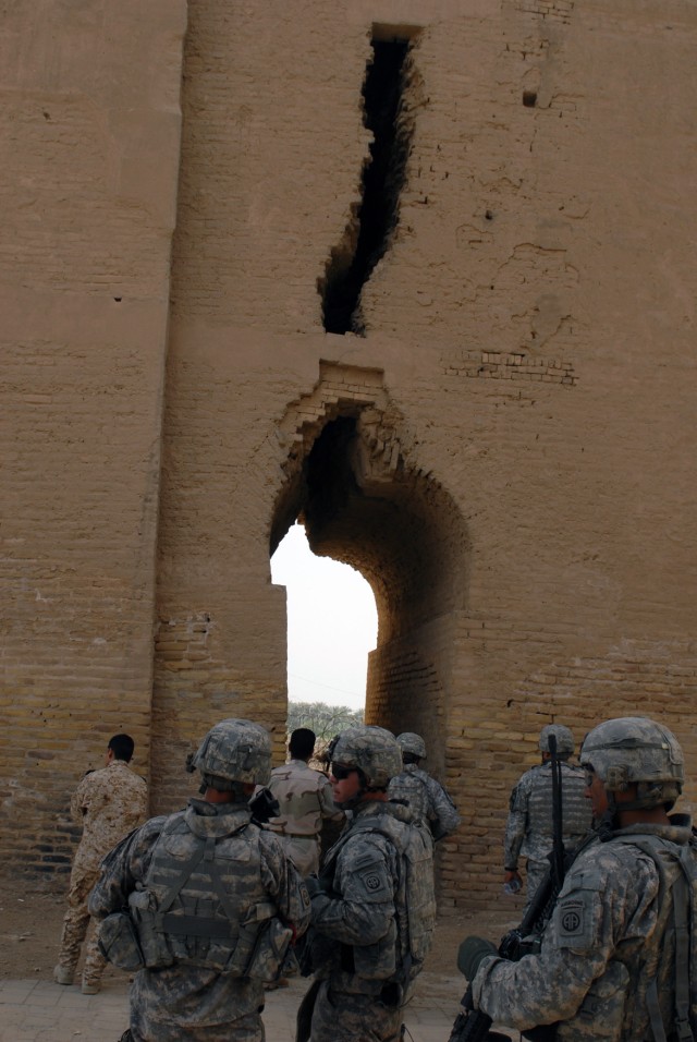 BAGHDAD -Brig Gen. John Murray, deputy commander for maneuver for Multi-National Division-Baghdad and the 1st Cavalry Division, along with others, stands before the famous crack in the Arch of Kessurah, a relic of the Persian Empire, more than...