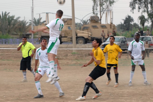 BAGHDAD - 1st Lt. Paul Wistermayer, from Denville, N.J., the assistant intelligence officer for Headquarters and Headquarters Company, 1st Battalion, 505th Parachute Infantry Regiment, takes a header in the opening round of the Combined Forces...