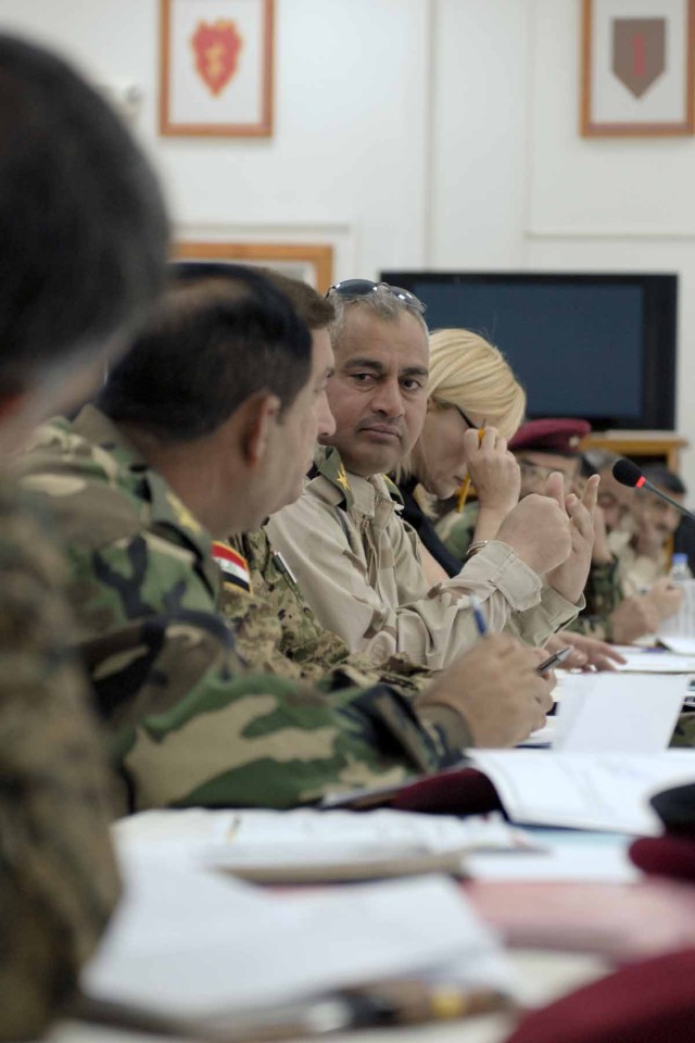 Representatives of the 2nd Iraqi Army Division discuss logistic efforts in western Ninewah province. The 3rd Iraqi Army Division and the 215th Brigade Support Battalion were also present for the conference, which was held at the Forward Operating Bas...