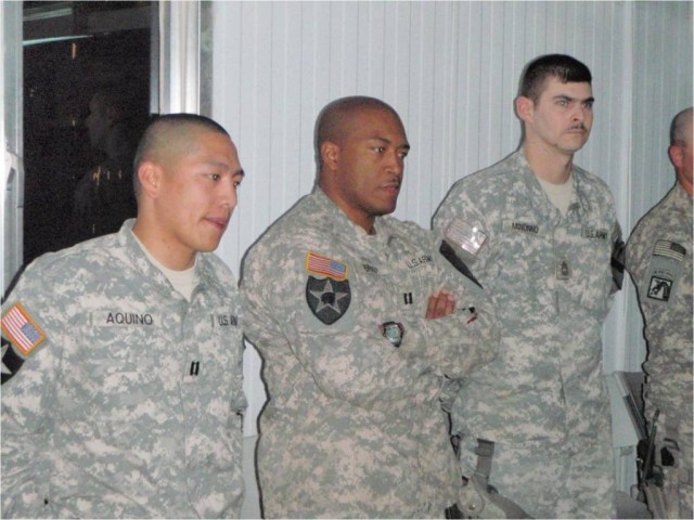 BAGHDAD-From left to right:  Capt. Alex Aquino, Capt. Andre Brady, and Master Sgt. Gregory Minonno.  The Squadron held a punch bowl ceremony at JSS Istiqlal on April 27 to honor these three leaders who have since left the 1st "Garryowen" Squadron,...