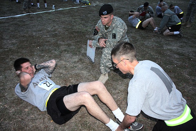 Soldier performs crunches during Steele Challenge