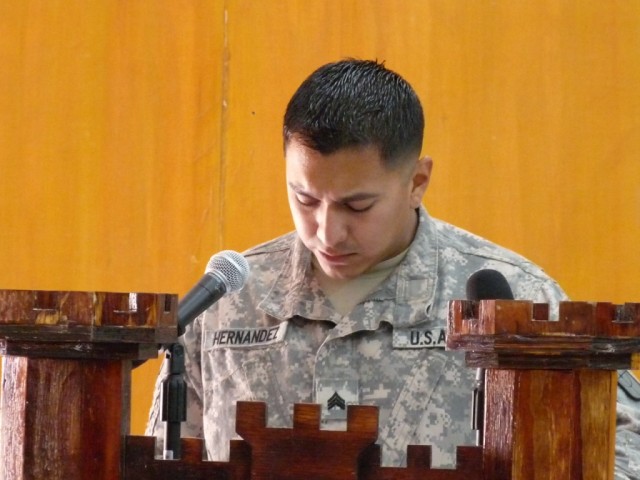 CAMP LIBERTY - Sgt. Alexis Hernandez, squad leader, 277th Engineer Company, a native of San Antonio, Texas, gives his Eulogy for Spc. Jacob Barton during the Memorial Ceremony held here, May 14.  Hernandez stated, "I was very proud of my Soldier.  I'...