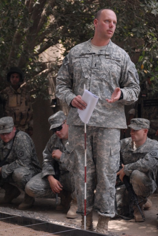 BAGHDAD -1st Lt. Kyle Poppe, of Polland, N.Y., briefs U.S. and Iraqi Army Engineers on the training route clearance mission to be held in the northeastern Baghdad district of Adhamiyah. Poppe said this is the first time 3rd Platoon, 515th Engineer...