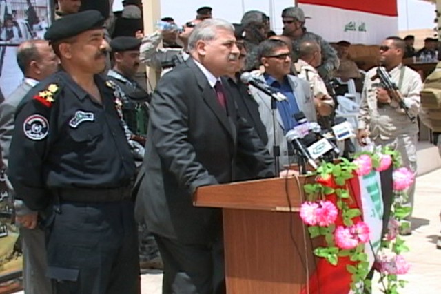 Ninewah Provincial Governor Atheel Al-Nujaifi speaks to a group of Iraqi Police basic training graduates during the last Iraqi Police basic training graduation ceremony in Mosul on May 11, 2009. This graduation marks the last class to graduate, fullf...
