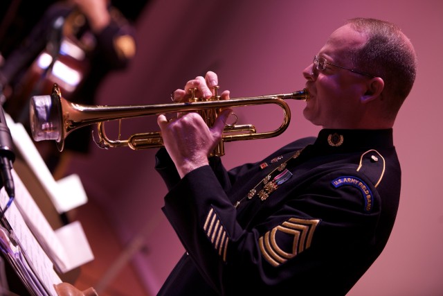 Master Sgt. Kevin Watt, trumpeter, wails at a concert for Delaware State University students.