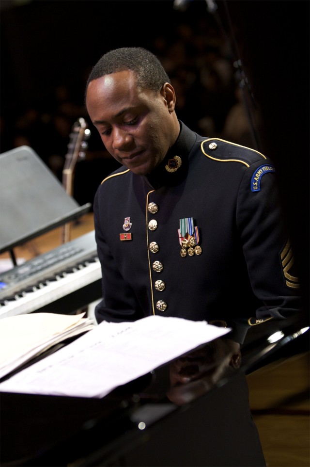 Sgt. 1st Class Tim Young plays piano for a full house in Emmaus, Penn.