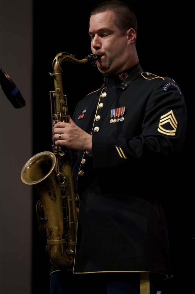 Sgt. 1st Class Pat Shook gets the crowd in Emmaus, Penn. wows the audience on the tenor sax.
