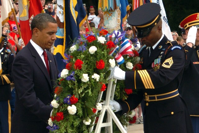 President Obama places wreath