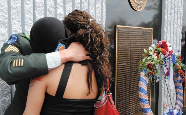 An emotional moment at the memorial