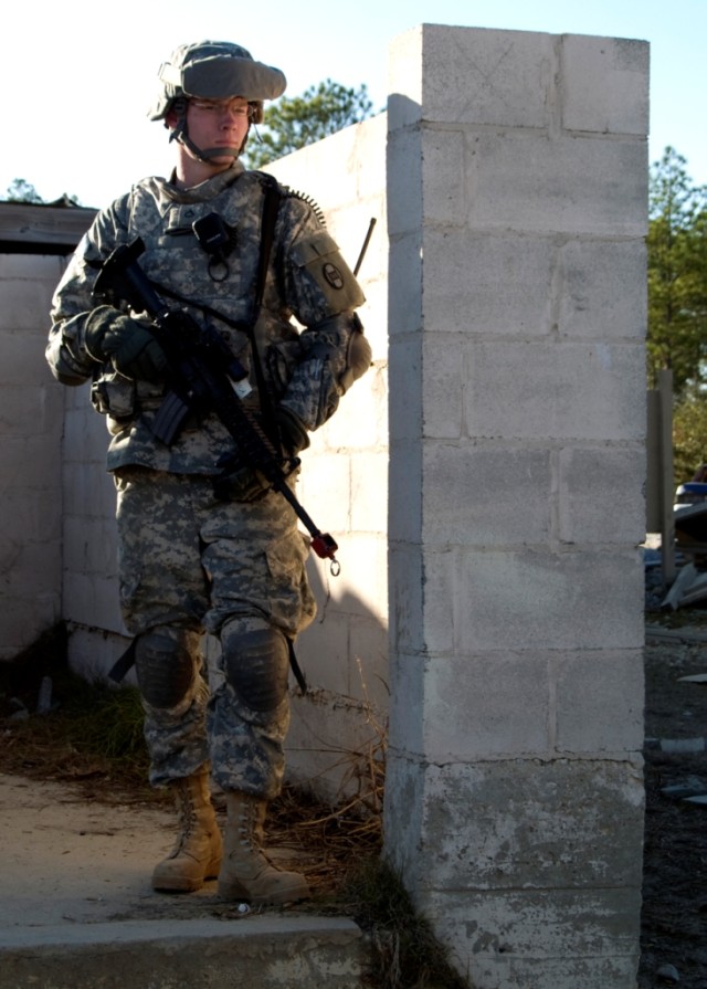 BAGHDAD - Pfc. Robert Kubas, part of the personal security detail for the 230th Brigade Support Battalion, 30th Heavy Brigade Combat Team, Multi-National Division -Baghdad, conducts dismounted operations training at Camp Shelby, Miss., January 29....