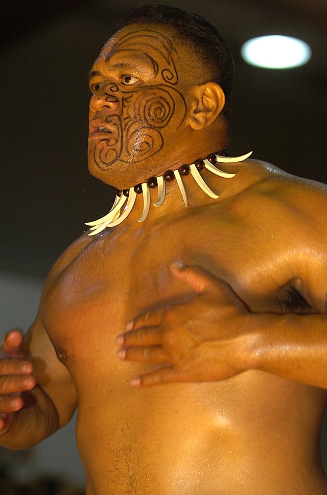 CAMP LIBERTY, Iraq - Air Force Staff Sgt. Salofi Leasiolagi, from Pago Pago, American Samoa, assigned to 447th Expeditionary Security Forces Squadron, 447th Air Expeditionary Group, performs a Samoan slap-dance at an Asian-Pacific American Heritage M...