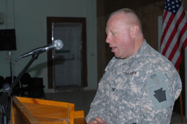 CAMP TAJI, Iraq - Chaplain (Col.) Bert Kozen, brigade chaplain, from Williamsport Pa., presides over the Memorial Day services, May 25, at the Warrior Chapel for Soldiers of the 56th Stryker Brigade Combat Team, 1st Cavalry Division,...