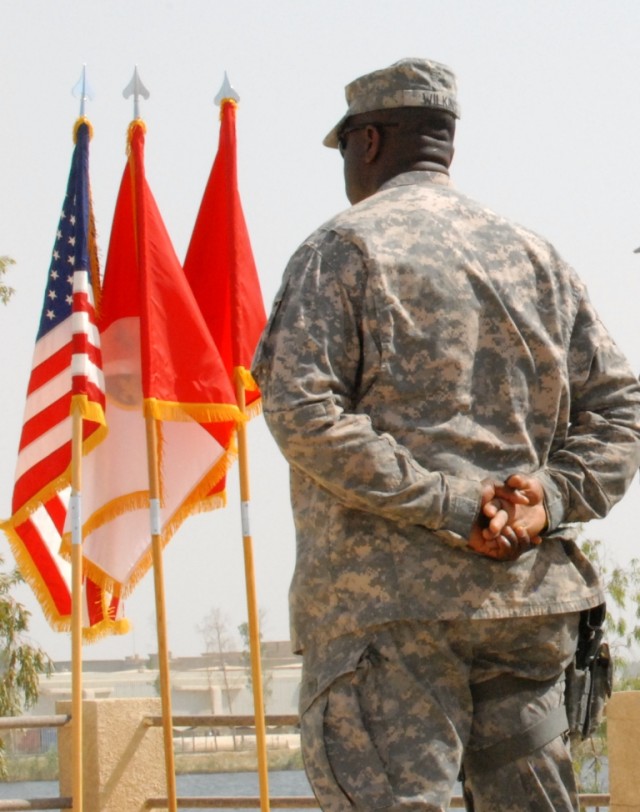 BAGHDAD - Staff Sgt. Garcia Wilkins, of Alexandria, La., observes a moment of silence in memory of fallen comrades on Memorial Day, May 25, on Camp Liberty, Iraq. "On this day, we remember all of our fallen heroes who gave their last breath, so that ...