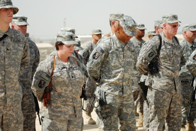 BAGHDAD -Soldiers from the 225th Engineer Brigade observe a moment of silence at 3 p.m. local time on Memorial Day, May 25, on Camp Liberty, Iraq. "On this day, we remember all of our fallen heroes who gave their last breath, so that we can take our ...