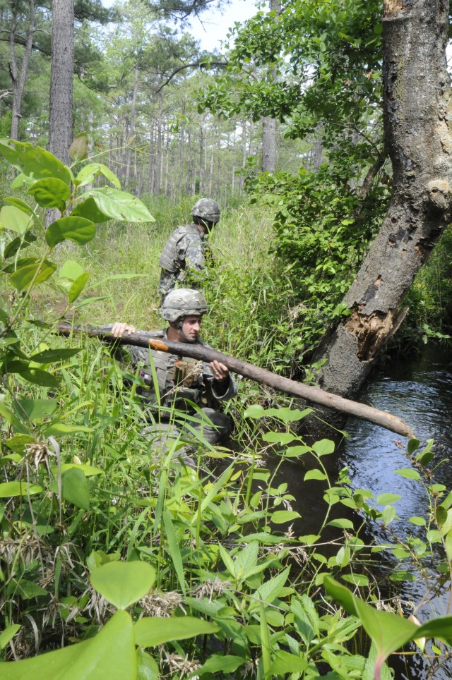 Trooper prepares to cross a creek