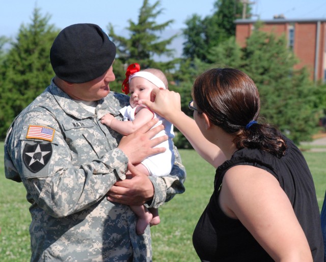 Soldier bids his Family farwell, as he deploys