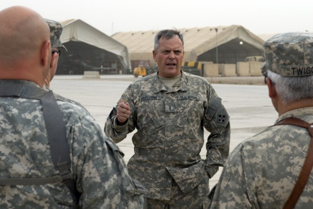 CAMP TAJI, Iraq-CW5 Lance McElhiney, from Harker Heights, Texas, the chief command warrant officer, 4th Combat Aviation Brigade, 4th Infantry Division, Multi-National Division-Baghdad, briefs senior warrant officers from the CAB and the 1st Air...