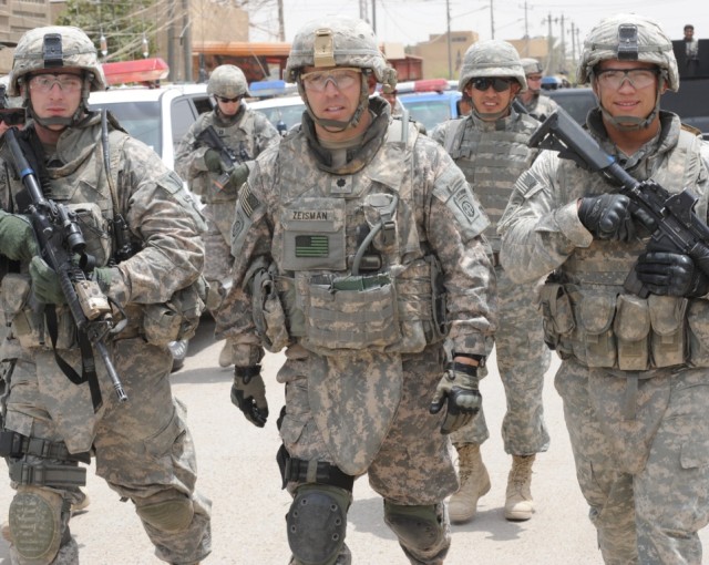 BAGHDAD - Lt. Col. Louis Zeisman (center), of Fayetteville, N.C., commander of the 2nd Battalion, 505th Parachute Infantry Regiment, 3rd Brigade Combat Team, 82nd Airborne Division, Multi-National Division-Baghdad, and Paratroopers assigned to the ba...