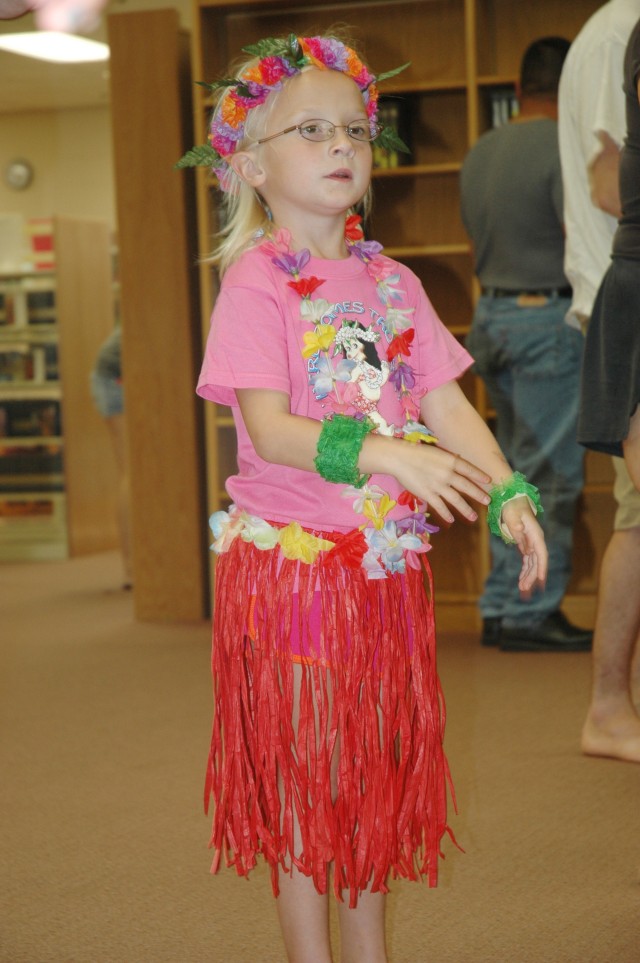 Families experience Hawaiian culture and dance at hula workshop