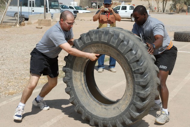 Sgt. Ricky Ford (right), a Tyler, Texas, native and a signal specialist, and Sgt. Robert Shaw, an Elmira, N.Y., native and a Human resources specialist, both with Headquarters and Headquarters Troop, 4th Battalion, 9th Cavalry Regiment, 2nd...