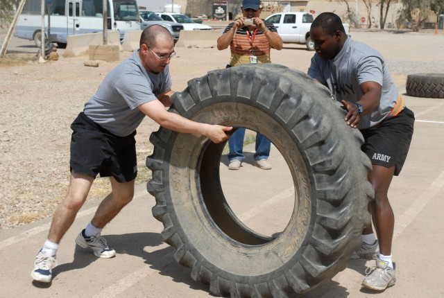 Sgt. Ricky Ford (right), a Tyler, Texas, native and a signal specialist, and Sgt. Robert Shaw, an Elmira, N.Y., native and a Human resources specialist, both with Headquarters and Headquarters Troop, 4th Battalion, 9th Cavalry Regiment, 2nd Brigade C...