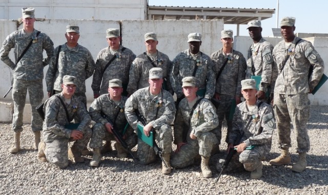 BAGHDAD - Bottom right: Spc. Daniel Parker, Mansfield Center, Conn., Staff Sgt. Dennis Bartlett, Plant City, Fla., Spc. Christopher Bortell, Waterville, Maine, Sgt. Dontai Smiley, Columbus, Ga., Pfc. Eric Vanstrander, Elmira, N.Y., Sgt. Nicholas...