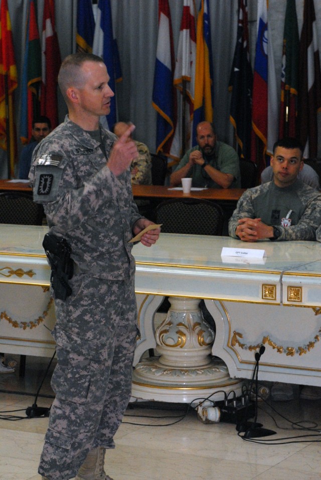 VICTORY BASE COMPLEX, Iraq - Lt. Col. Geoffrey Stevens, from Melrose, Mass., commander of 79th Ordnance Battalion (EOD), discusses the importance of interagency cooperation for the future of Baghdad's explosive ordinance disposal operations....